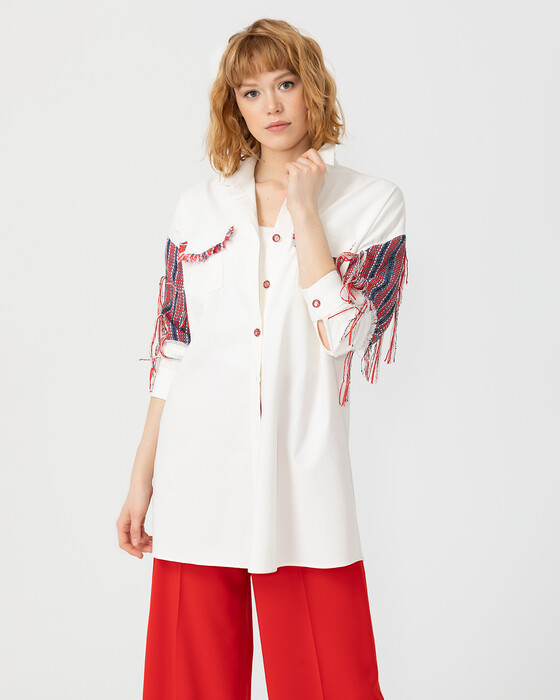 TUNIC WITH TASSEL DETAIL