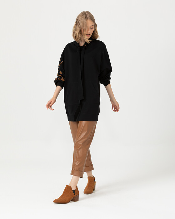 LEATHER LOOK TROUSERS WITH OVERSIZE